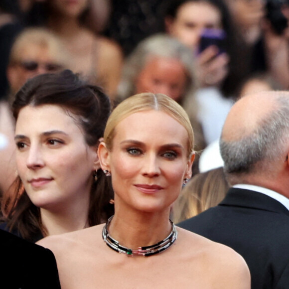 Diane Kruger, accompagné de son amoureux Norman Reedus, juste à côté de Guillaume Canet - Montée des marches pour la cérémonie de clôture du 75ème Festival International du Film de Cannes. Le 28 mai 2022