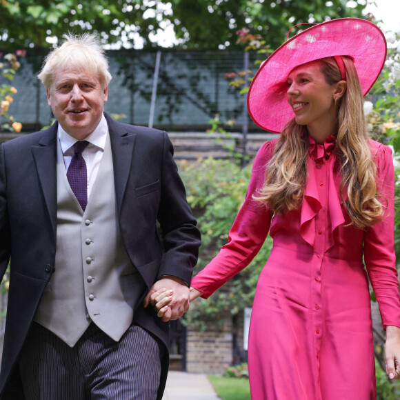 Le premier ministre Boris Johnson et sa femme Carrie Symonds lors de la parade militaire "Trooping the Colour" dans le cadre de la célébration du jubilé de platine (70 ans de règne) de la reine Elizabeth II à Londres, le 2 juin 2022.