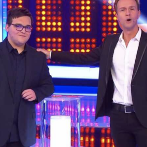 Enzo, candidat phénomène du jeu "Le Grand Slam" sur France 3 avec Cyril Féraud