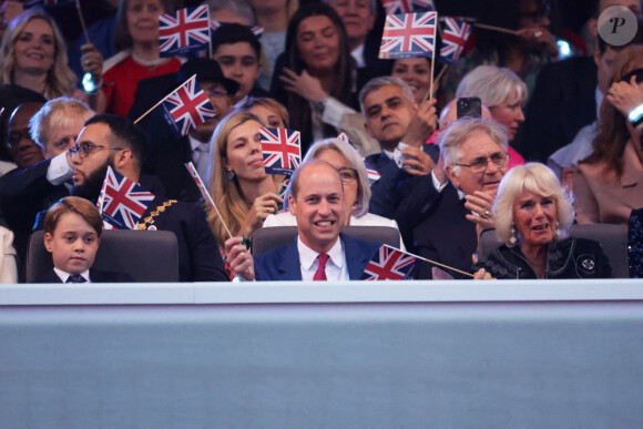 Le prince George, le prince William, duc de Cambridge and Camilla Parker Bowles, duchesse de Cornouailles - La famille royale d'Angleterre lors du concert devant le palais de Buckingham à Londres, à l'occasion du jubilé de platine de la reine d'Angleterre. Le 4 juin 2022 