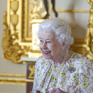 La reine Elisabeth II d'Angleterre lors de la commémoration du 70e anniversaire de la compagnie "Halcyon Days" au château de Windsor. Le 23 mars 2022 