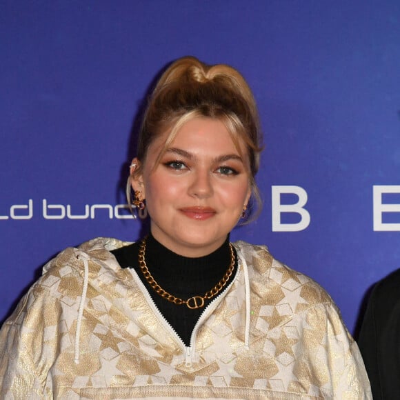 Louane et son compagnon Florian Rossi - Avant Première de " Belle " film animé japonais au Grand Rex à Paris le 6 décembre 2021 . © Veeren / Bestimage 