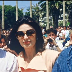 Jean-Louis Trintignant, Anouk Aimée et Claude Lelouch au Festival de Cannes en 1986