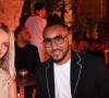 Exclusif - Dimitri Payet avec sa femme Ludivine lors de la soirée du grand gala du "Marrakech du Rire 2022" pour la 10ème édition au palais El Badiî à Marrakech, Maroc, le 18 juin 2022. © Rachid Bellak/Bestimage
