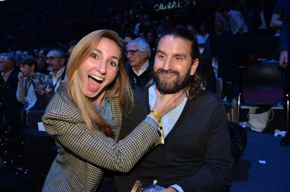 Marie Portolano et son mari Grégoire Ludig lors du gala de boxe Univent à l'AccorHotels Arena de Paris pour le championnat du monde WBA. © Veeren / Bestimage 