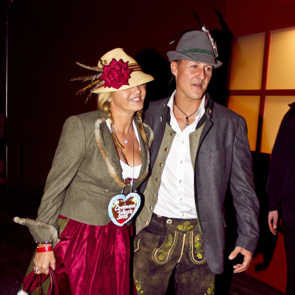 Michael Schumacher et sa femme Corinna lors de la soiree Oktoberfest a Munich le 1er octobre 2013. (c) Arthur Thill