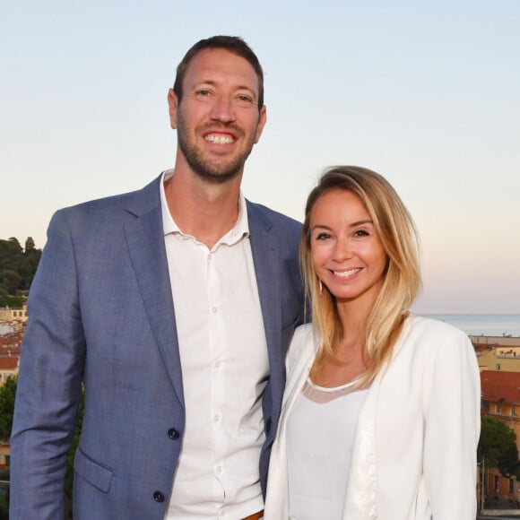 Alain Bernard et sa fiancée Faustine durant la soirée d'ouverture du 24ème Festival du Livre de Nice sur le toit terrasse de l'hôtel Aston la Scala, le 31 mai 2019. © Bruno Bebert/Bestimage 