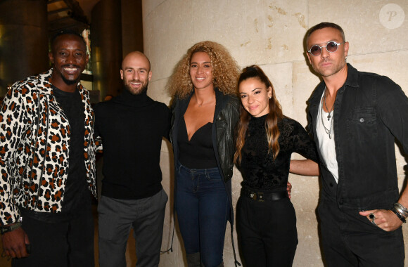 Moussa Niang et sa femme Gaya, François Alu, Denitsa Ikonomova et Maxime Dereymez - Visite privée de l'exposition Cinémode par Jean-Paul Gaultier à la cinémathèque française à Paris le 3 octobre 2021. © Veeren Ramsamy - Christophe Clovis/Bestimage 