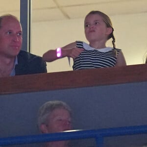 Le prince William, duc de Cambridge, et Catherine (Kate) Middleton, duchesse de Cambridge, avec la princesse Charlotte de Cambridge assistent à l'épreuve de gymnastique artistique lors des Jeux du Commonwealth de Birmingham, le 2 août 2022. 