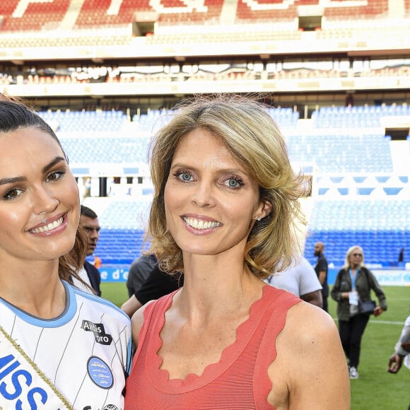 Diane Leyre, Miss France 2022 et Sylvie Tellier lors du match de football caritatif (Le match des héros Unicef) entre l'OL Légendes et la team Unicef au Groupama Stadium à Lyon en faveur des enfants d'Ukraine et pour célébrer les 20 ans du premier titre de Champion de France de l Olympique Lyonnais le 10 mai 2022. © Pierre Perusseau / Bestimage 