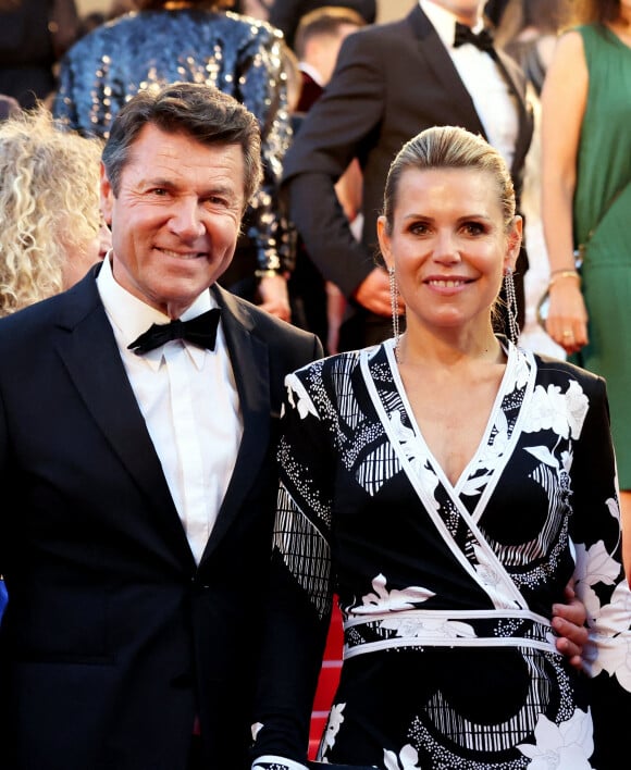 Christian Estrosi, maire de Nice, et sa femme Laura Tenoudji-Estrosi - Montée des marches du film " Mascarade " lors du 75ème Festival International du Film de Cannes.  © Dominique Jacovides / Bestimage 