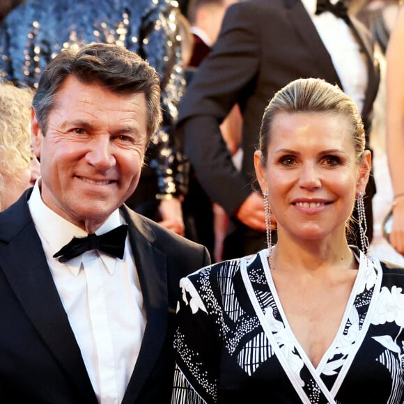 Christian Estrosi, maire de Nice, et sa femme Laura Tenoudji-Estrosi - Montée des marches du film " Mascarade " lors du 75ème Festival International du Film de Cannes.  © Dominique Jacovides / Bestimage 