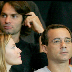 Jean-Luc Delarue et Elisabeth Bost en 2006 dans les tribunes du Parc des princes