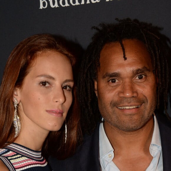 Semi-Exclusif - Christian Karembeu et sa femme Jackie Chamoun - A l'occasion des 20 ans de la victoire de l'équipe de France, les bleus se sont rendus à un dîner organisé au Buddha Bar avec tous les joueurs et leur famille. © Rachid Bellak/Bestimage