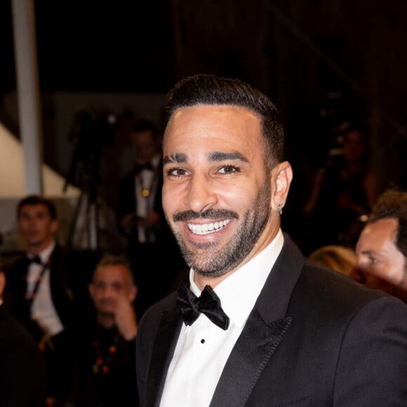 Adil Rami - Montée des marches du film "Novembre" lors du 75ème Festival International du Film de Cannes, le 22 mai 2022. © Cyril Moreau / Bestimage