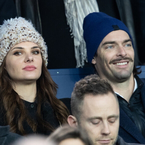 Camille Lacourt et sa compagne Alice Detollenaere (Miss Bourgogne 2010) dans les tribunes lors du match de championnat de Ligue 1 Conforama opposant le Paris Saint-Germain (PSG) aux Girondins de Bordeaux au Parc des Princes à Paris, France, le 23 février 2020. Le PSG a gagné 4-3. © Cyril Moreau/Bestimage