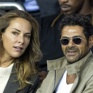 Jamel Debbouze et Mélissa Theuriau assistent au match aller de la Ligue des Champions entre le Paris Saint-Germain contre la Juventus (2-1) au Parc des Princes à Paris le 6 septembre 2022.