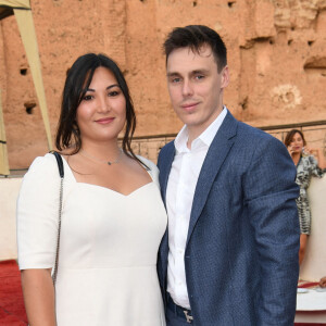 Louis Ducruet et sa femme Marie au photocall de la soirée du grand gala du "Marrakech du Rire 2022" pour la 10ème édition au palais El Badiî à Marrakech, Maroc, le 18 juin 2022. © Rachid Bellak/Bestimage 