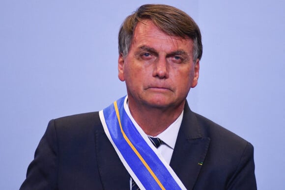 Jair Bolsonaro (président de la République fédérative du Brésil), participe à la cérémonie de remise des distinctions de l'Ordre du mérite du ministère de la Justice à Brasilia, le 25 mars 2022.