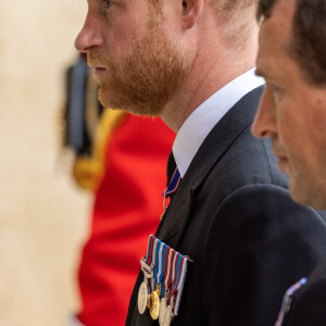 Le prince Harry, duc de Sussex - Procession pédestre des membres de la famille royale depuis la grande cour du château de Windsor (le Quadrangle) jusqu'à la Chapelle Saint-Georges, où se tiendra la cérémonie funèbre des funérailles d'Etat de reine Elizabeth II d'Angleterre. Windsor, le 19 septembre 2022 