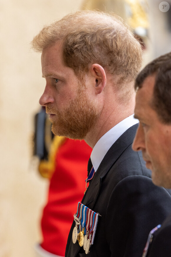 Le prince Harry, duc de Sussex - Procession pédestre des membres de la famille royale depuis la grande cour du château de Windsor (le Quadrangle) jusqu'à la Chapelle Saint-Georges, où se tiendra la cérémonie funèbre des funérailles d'Etat de reine Elizabeth II d'Angleterre. Windsor, le 19 septembre 2022 