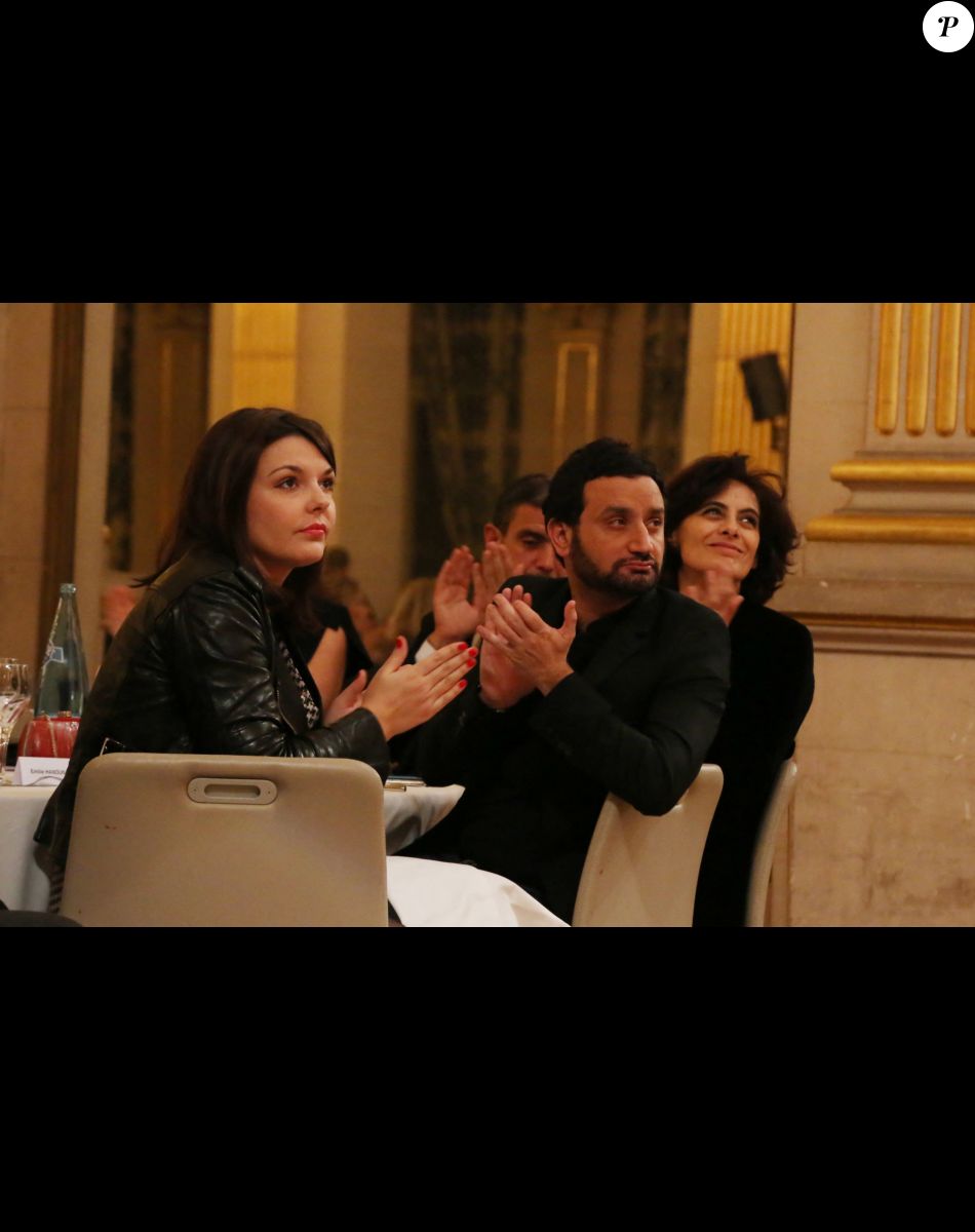 Exclusif - Cyril Hanouna et sa compagne Emilie - Soiree annuelle de la FIDH (Federation Internationale des Droits de l'homme) et 65eme anniversaire de la Declaration universelle des Droits de l'Homme a l'Hotel de Ville de Paris le 10 decembre 2013.