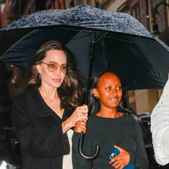 Angelina Jolie fait du shopping avec ses enfants Zahara et Maddox à New York.