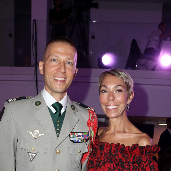 Exclusif - Prix Spécial- No tabloïd - No Web - Lieutenant-colonel Raphaël Benda et Mathilde Favier - Le professeur S.Lyonnet, président de l'Institut des maladies génétiques, et le galériste K. Mennour ont organisé la 4ème édition de la soirée "Heroes for Imagine", une grande vente aux enchères d’oeuvres d'art, animée par G.Elmaleh et dirigée par Christie's, à l'institut Imagine, 24 boulevard du Montparnasse dans le 15ème arrondissement de Paris, France, le 12 septembre 2022. La vente aux enchères a rapporté plus de huit millions d'euros. "Grâce à HEROES, la recherche sur les maladies génétiques s'accélère, quels que soient les obstacles, au bénéfice des enfants malades et de leurs familles. Avec virtuosité et engagement, les chercheurs et les médecins de l'Institut Imagine, pratiquent la meilleure science d'aujourd'hui pour inventer la mailleure médecine de demain". © Dominique Jacovides/Bestimage  No Web pour la Belgique et la Suisse Exclusive - For Germany Call For Price - No Web - Celebs attend the "Heroes for Imagine" art auction at institut Imagine in Paris, France, on September 12, 2022. 