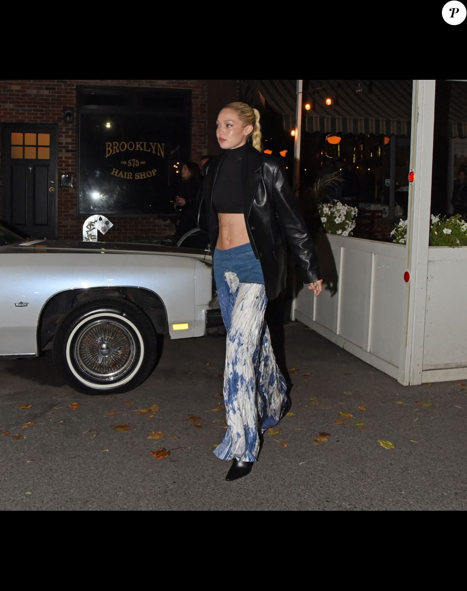 Gigi Hadid à la sortie de la soirée d'anniversaire de Bella (26 ans) au restaurant "Lucali Pizza" à Brooklyn, le 9 octobre 2022.