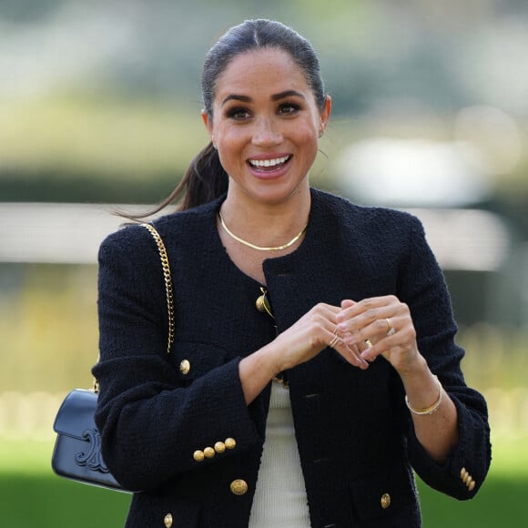 Le prince Harry et Meghan Markle lors du "Land Rover Challenge" au premier jour des Invictus Games 2020 à La Haye, le 16 avril 2022. 