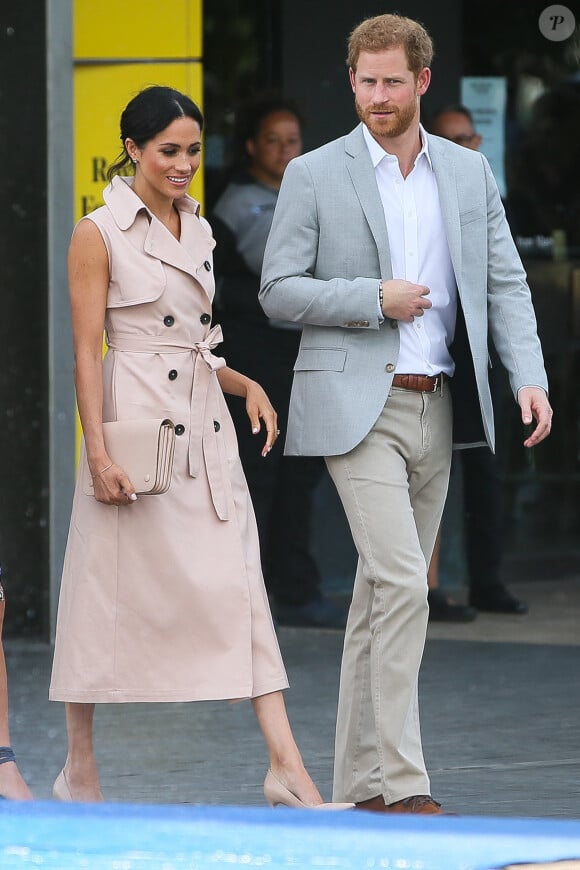 Le prince Harry, duc de Sussex et sa femme Meghan Markle, duchesse de Sussex, arrivent à l'exposition commémorative du centenaire de la naissance de Nelson Mandela au centre Southbank à Londres le 17 juillet 2018 