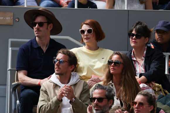 Grégory Nicolaidi, Elodie Frégé en tribunes lors des Internationaux de France de tennis de Roland Garros à Paris, France, le 26 mai 2022.