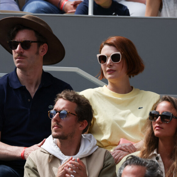 Grégory Nicolaidi, Elodie Frégé en tribunes lors des Internationaux de France de tennis de Roland Garros à Paris, France, le 26 mai 2022.