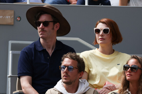 Grégory Nicolaidi, Elodie Frégé en tribunes lors des Internationaux de France de tennis de Roland Garros à Paris, France, le 26 mai 2022.