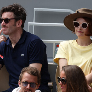 Grégory Nicolaidi, Elodie Frégé en tribunes lors des Internationaux de France de tennis de Roland Garros à Paris, France, le 26 mai 2022.