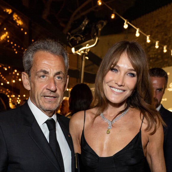 Carla Bruni et son mari Nicolas Sarkozy - Personnalités à la soirée "Women In Motion" par Kering au Château de la Castre lors du 75ème Festival International du Film de Cannes. Le 22 mai 2022. © Olivier Borde / Bestimage.