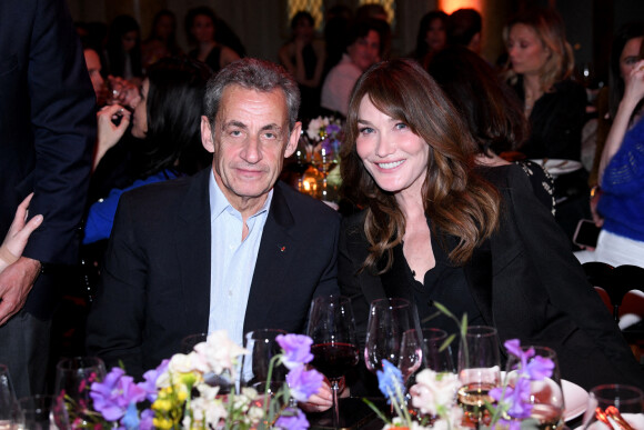Nicolas Sarkozy et sa femme Carla Bruni-Sarkozy - Dîner des "Femmes Culottées" Etam au Musée de la Monnaie à Paris le 22 mars 2022. © Rachid Bellak/Bestimage.
