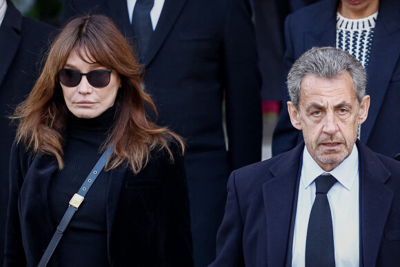 Carla Bruni, son mari Nicolas Sarkozy - Sorties des obsèques de Jean-Pierre Pernaut en la Basilique Sainte-Clotilde à Paris, France le 9 mars 2022. © Aurelien Morissard/Panoramic/Bestimage.