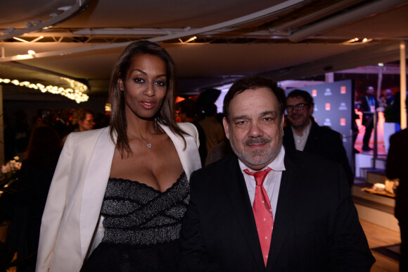 Didier Bourdon et sa femme Marie-Sandra Badini à la soirée "Orange" sur la plage de l'hôtel Majestic lors du 72ème Festival International du Film de Cannes, le 18 mai 2019. © Rachid Bellak/Bestimage 