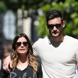 Exclusif - Le footballeur Hugo Lloris avenue Montaigne avec son épouse Marine.