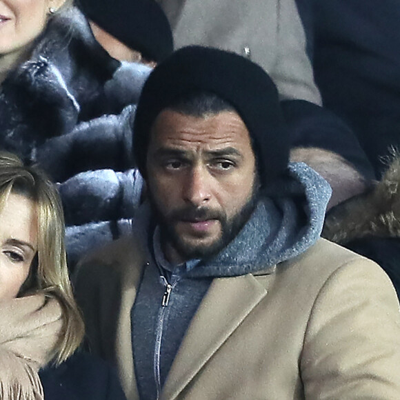 Semi-exclusif - Maxim Nucci et sa compagne Isabelle Ithurburu enceinte assistent au huitième de finale retour de Ligue des Champion, du Paris Saint-Germain contre le Real Madrid au Parc des Princes à Paris le 6 mars 2018. © Cyril Moreau/Bestimage