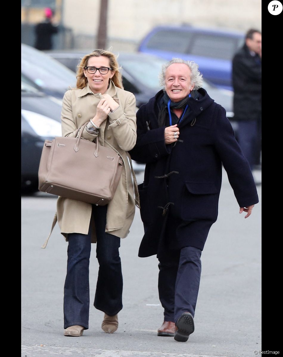 Didier Barbelivien et sa femme Laure en 2012 allant à un meeting de Nicolas Sarkozy