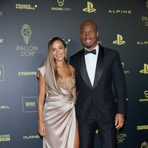 Didier Drogba et sa compagne Gabrielle Lemaire - Photocall de la 66ème cérémonie du Ballon d'Or au Théâtre du Chatelet à Paris. © Cyril Moreau/Bestimage