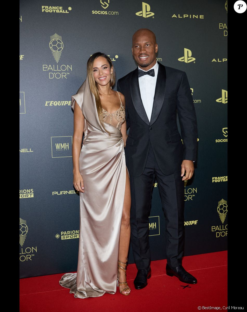Didier Drogba et sa compagne Gabrielle Lemaire - Photocall de la 66ème cérémonie du Ballon d'Or au Théâtre du Chatelet à Paris. © Cyril Moreau/Bestimage
