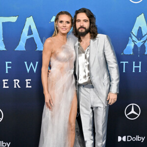 Heidi Klum et son mari Tom Kaulitz à la première du film "Avatar 2 : La voie de l'eau" de la société de production 20th Century Studios au théâtre Dolby à Hollywood, Los Angeles, Californie, Etats-Unis, le 12 décembre 2022. 