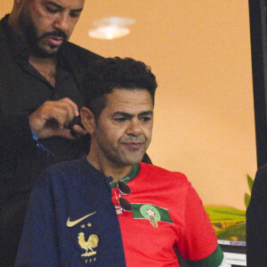 Jamel Debbouze et Wilfried Mbappé - Les célébrités assistent au match de demi-finale "France - Maroc" lors de la Coupe du Monde 2022 au Qatar (FIFA World Cup Qatar 2022), le 14 décembre 2022. © JB Autissier / Panoramic / Bestimage