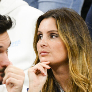 Hugo Lloris et sa femme Marine - People et joueurs en famille dans les tribunes lors du match de demi-finale "France - Maroc" lors de la Coupe du Monde 2022 au Qatar (FIFA World Cup Qatar 2022). © JB Autissier / Panoramic / Bestimage