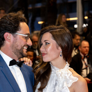 Thomas Hollande, sa femme Emilie Broussouloux - Montée des marches du film "R.M.N." lors du 75ème Festival International du Film de Cannes, le 21 mai 2022. © Cyril Moreau / Bestimage 