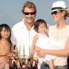 Johnny Hallyday, sa femme Laeticia et leurs filles Jade et Joy. Eté 2009