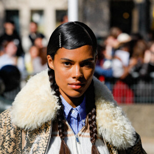 Tina Kunakey au défilé Miu Miu Collection Femme Prêt-à-porter Printemps/Eté 2023 lors de la Fashion Week de Paris (PFW), le 4 octobre 2022. © Veeren-Clovis/Bestimage